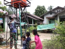Anggota Satgas Selesaikan Finishing Sumur Bor